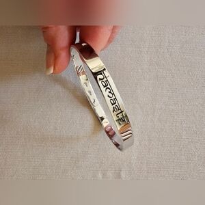 EUC Chelsea Taylor Memory Bracelet Namaste Silvertone Adjustable Bracelet